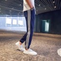Men's autumn and winter casual pants men's sports pants men's small foot binding hip hop versatile side three bar guard pants
