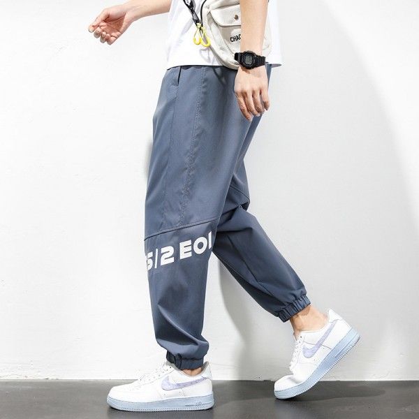 Casual pants men's spring new products Korean fashion versatile fashion youth loose Leggings nine division of labor sports pants