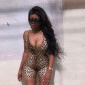 Foreign trade European and American style 2021 summer new women's sleeveless V-neck exposed backpack hip slim fit leopard integrated pants women