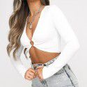 2021 European and American spring and autumn ins new women's wear sexy V-neck hollowed out splicing slim fitting long sleeve solid color bottomed blouse 