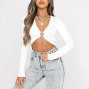 2021 European and American spring and autumn ins new women's wear sexy V-neck hollowed out splicing slim fitting long sleeve solid color bottomed blouse 